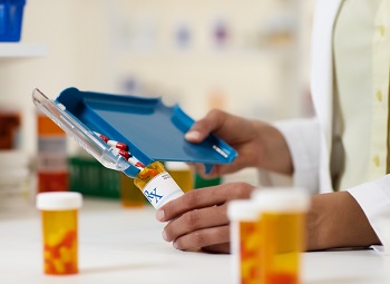 Pharmacist filling a prescription